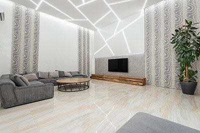 Why Us? Modern open-plan living room with recessed lighting
